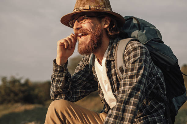 istock Cheerful bearded traveler in nature 1215733693