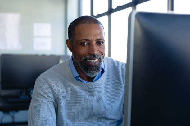 istock African American man in office looking at camera 1215734600