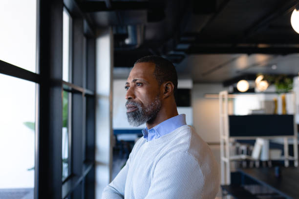 istock African American man looking outside 1215734738