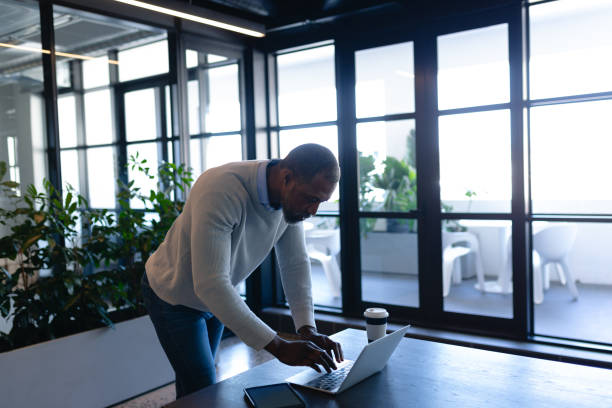istock African American man working on his laptop 1215734745