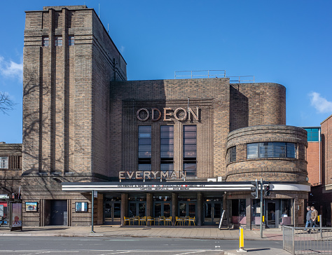 York, Yorkshire, UK, 03/14/2019 - Old brick built art deco Odeon cinema in York on a sunny day with blue sky.