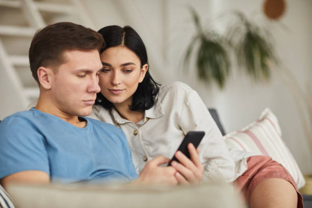istock Couple Ordering Food via Smartphone 1215736502