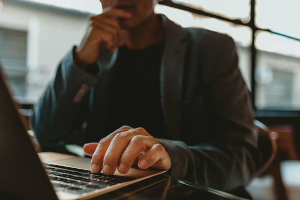 istock Businessman working on laptop 1215738174