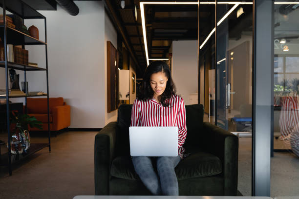istock African American woman using her laptop 1215738252