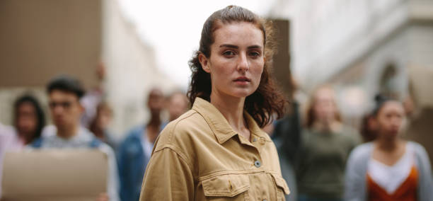 istock Female activist leading a protest for their civil rights 1215739808