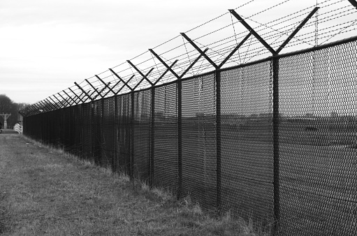 Barbed wire fence abstract