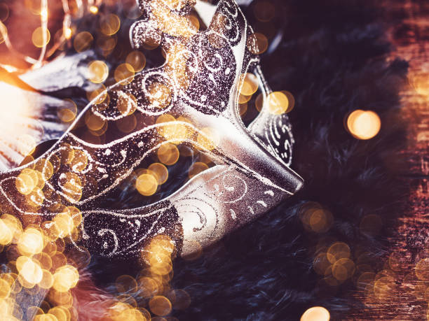 Vintage mask on a brown background. Close-up