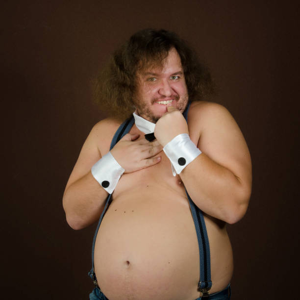 istock Funny fat man on a diet. 1215741283