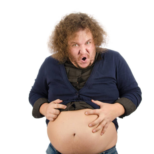 istock Funny fat man on a diet. 1215741869