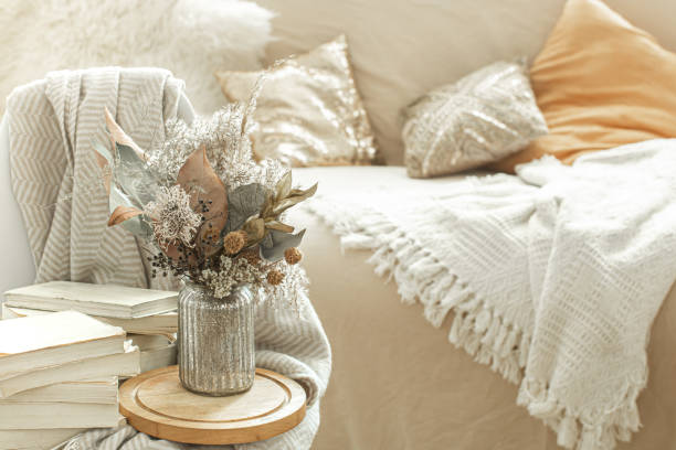 istock Home interior with books and dried flowers. 1215742015