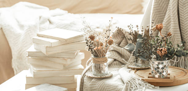 istock Home interior with books and dried flowers. 1215742042