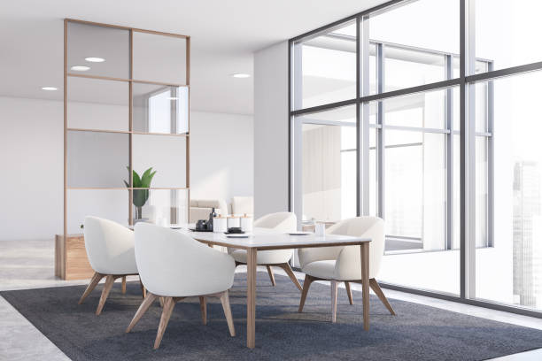 istock White dining room corner with armchairs 1215742688