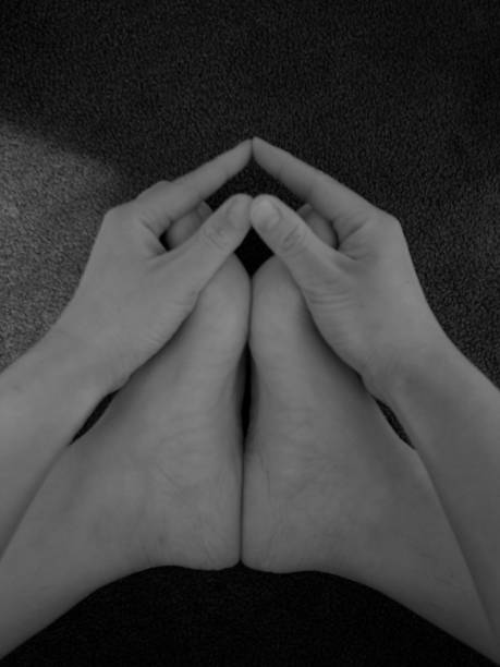 istock Artistic shape of hands and feet. 1215743139