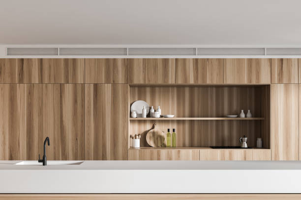 istock Wooden kitchen interior with island 1215743796