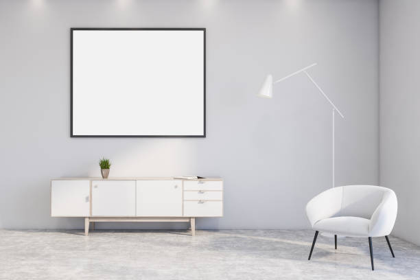 istock White living room with armchair and poster 1215744952