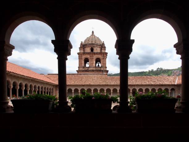 istock Symmetric arches around cloister courtyard 1215745056