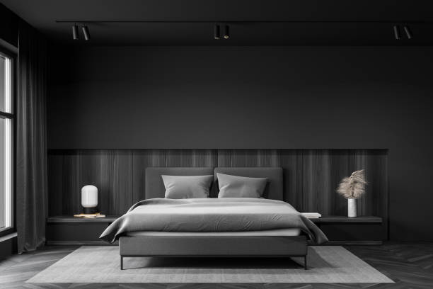 istock Gray and wooden master bedroom interior 1215746115