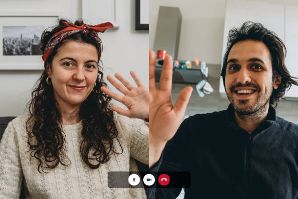 istock Screenshot of a videoconference with young couple connecting together 1215746686