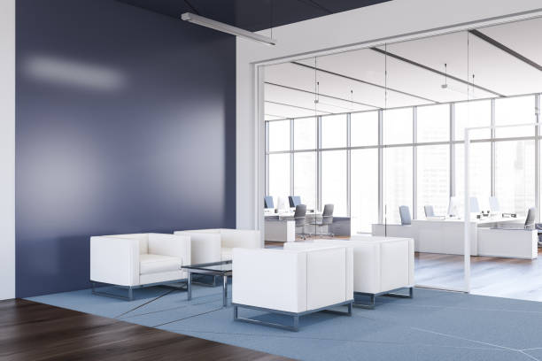 istock Blue office lounge area corner with armchairs 1215747094