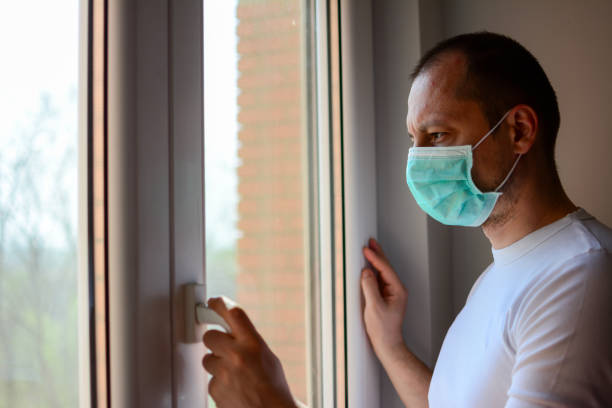 istock Attractive male who cannot leave the house due to an epidemic 1215749852