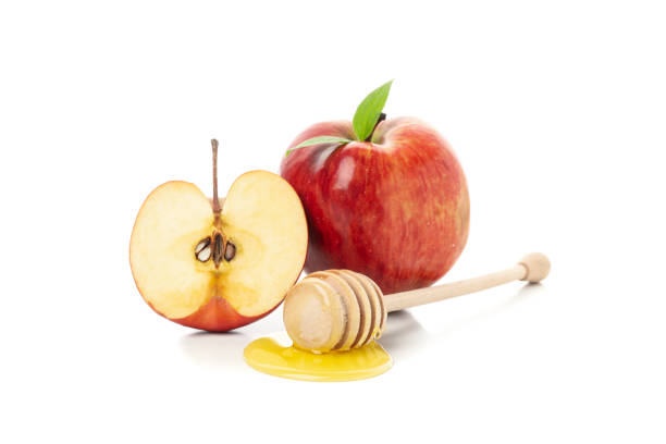 istock Apples and honey isolated on white background. Natural treatment 1215749918