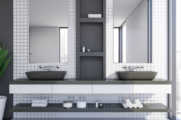 istock White tile bathroom interior with double sink 1215750172