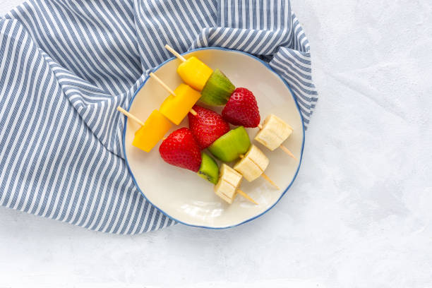 istock Healthy assorted fruit skewers from above 1215751463