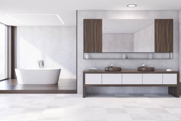 istock White and wooden bathroom interior, tub and sink 1215751521