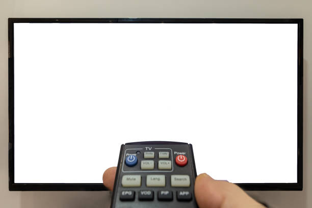 istock Changing the channels on a TV concept 1215751702
