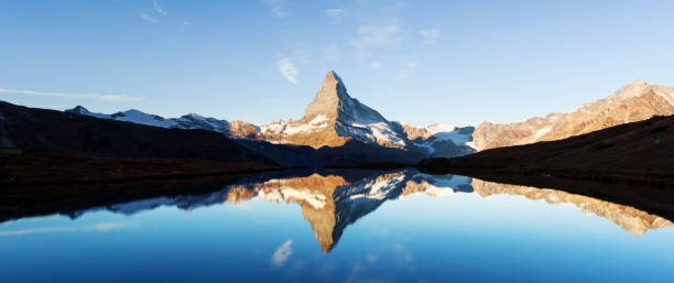 istock Matterhorn peak on Stellisee lake 1215751730