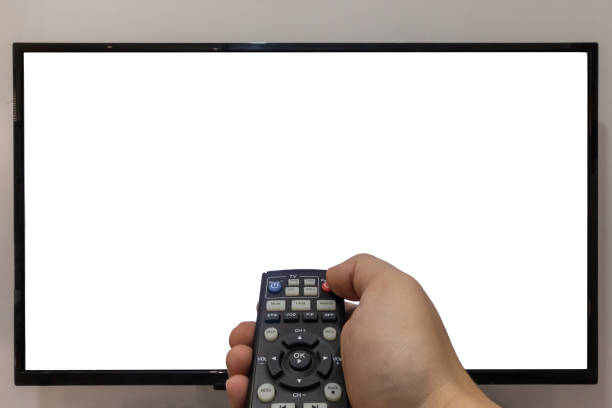 istock Changing the channels on a TV concept 1215751954