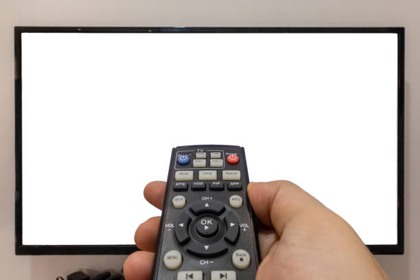 istock Changing the channels on a TV concept 1215751975