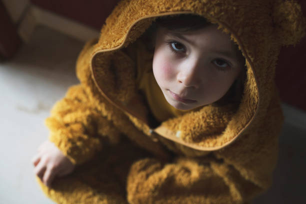 istock Sad child in isolation at home 1215754605