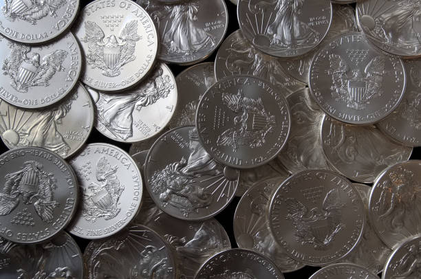 istock Many newAmerican Eagle silver coins 1215755415