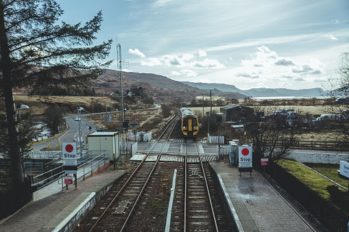Isle of Skye/UK-20/3/18: First ScotRail Class 156 Super Sprinter approaching to Strathcarron railway station on the Kyle of Lochalsh Line, serving the Strathcarron village in the Scottish Highlands