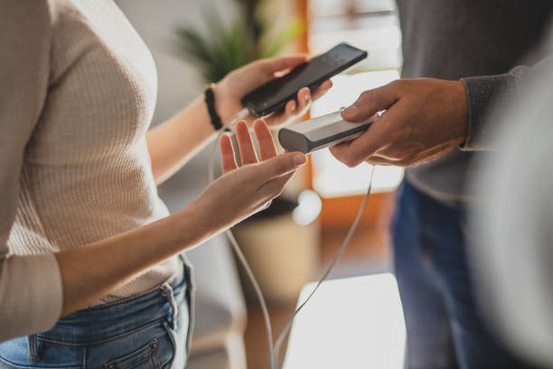 istock Couple charging smart phone with power bank 1215759962