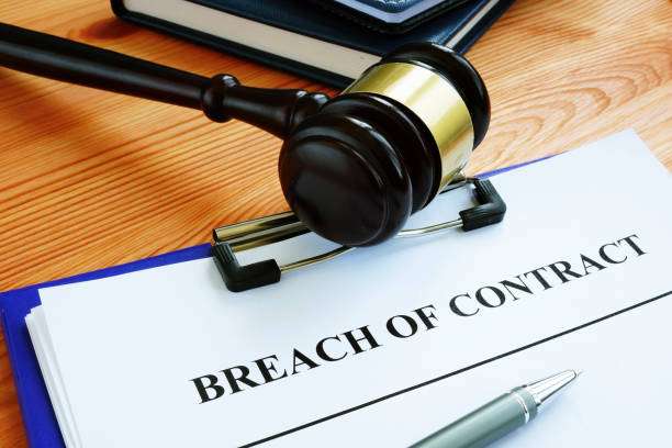 istock Breach of contract papers with pen and gavel. 1215761485