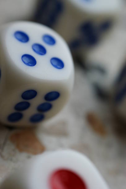 istock dice game many pieces closeup colorful dots 1215767268