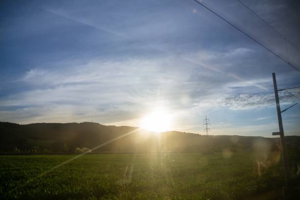 istock Sunrise or sunset over the hills and meadow. 1215771439