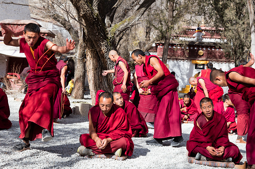 Debates among monks on the Buddhist doctrines in the colleges in the Sera Monastery complex. This facilitates better comprehension of the Buddhist philosophy to attain higher levels of study. This exemplary debating tradition supplemented with gestures are held as per a set schedule, every day in the 'Debating Courtyard' of the monastery.