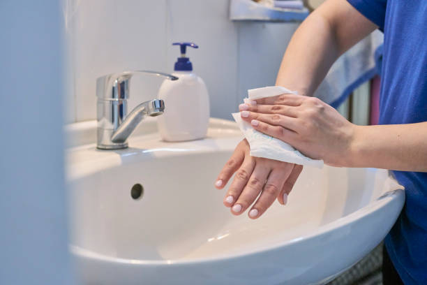 istock Woman washing hands 1215772362
