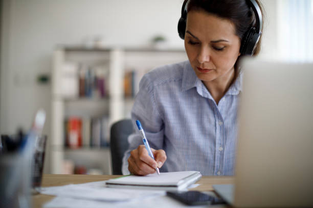 istock Mature woman working from home 1215772482