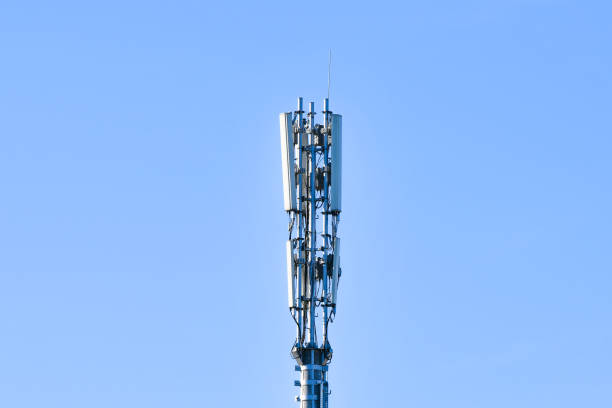 istock Digital telephone antenna. GSM tower on a blue background. 5g 4g 1215773901