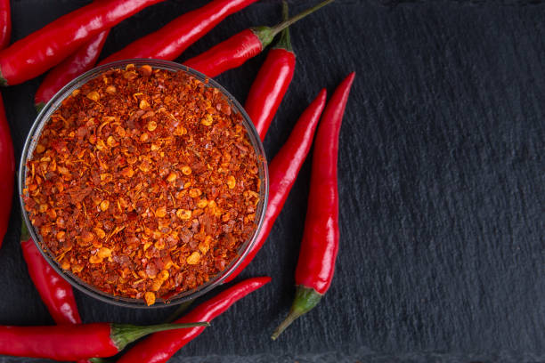 istock dry ground pepper and red chili pepper top view with copy space 1215776011