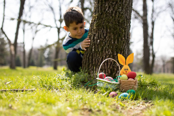 istock Easter Egg hunt in a park stock photo 1215776108