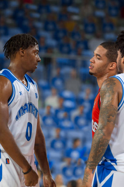 istock Basketball players looking at each 1215776250