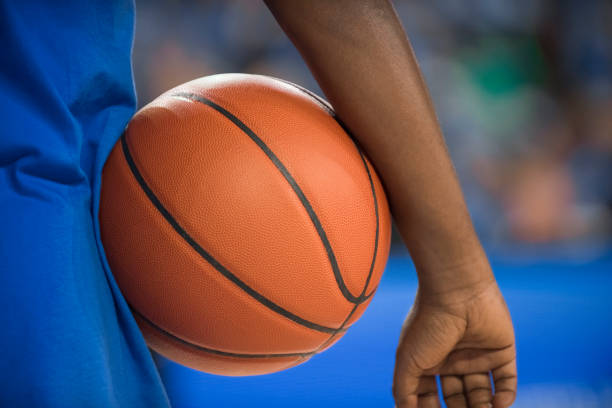istock Basketball player with ball 1215776299