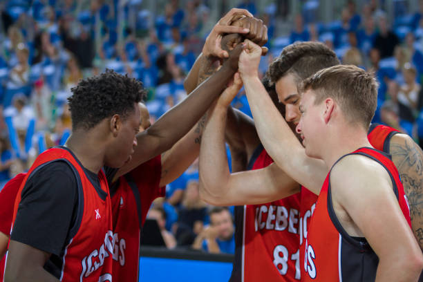 istock Basketball players in huddle 1215776304
