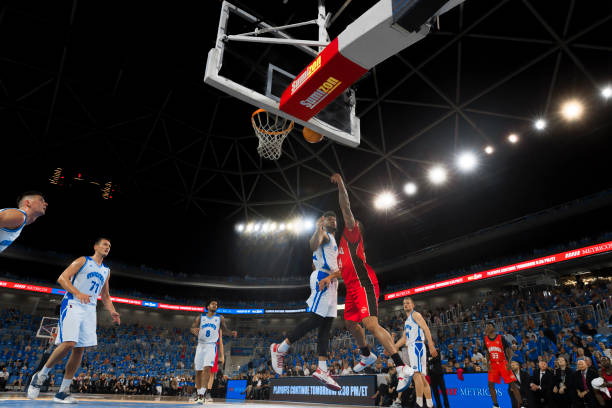 istock Basketball player attempting to dunk 1215776308