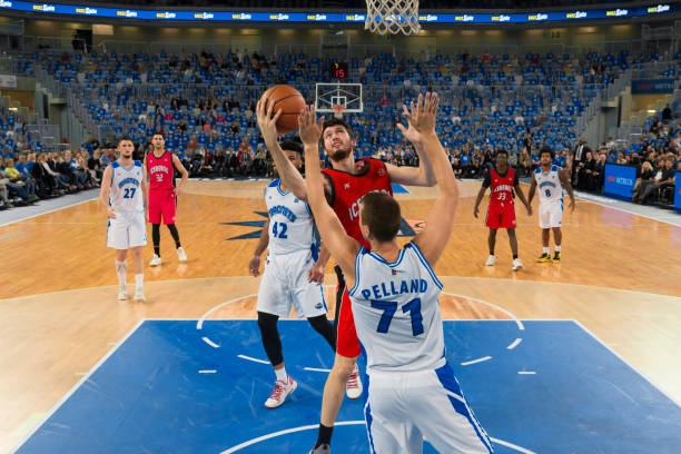 istock Basketball player attempting to dunk 1215776344